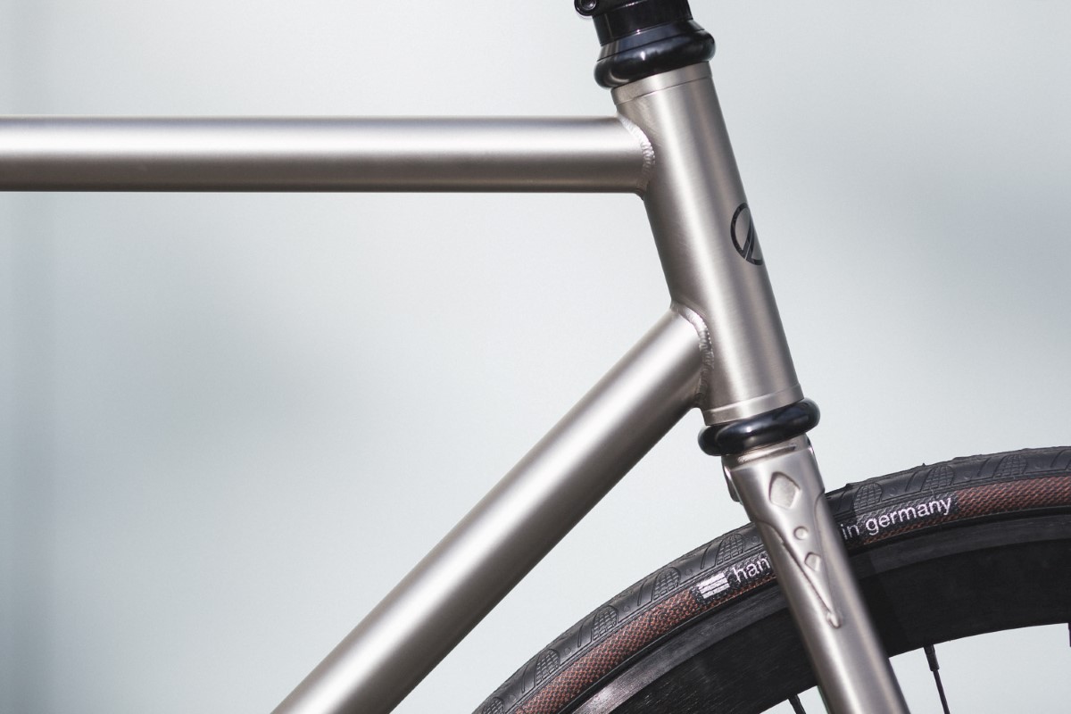 raw steel bike frame